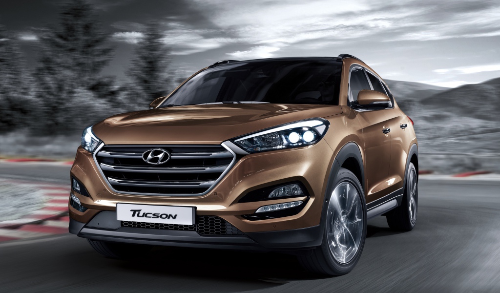 Автомобиль Hyundai Tucson коричневого цвета 