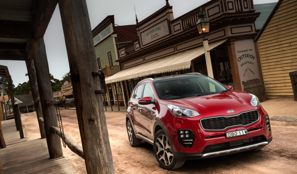 Красный внедорожник  Kia Sportage