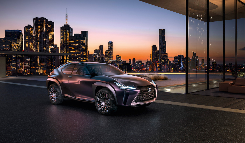 Стильный кроссовер Lexus UX на фоне ночного города