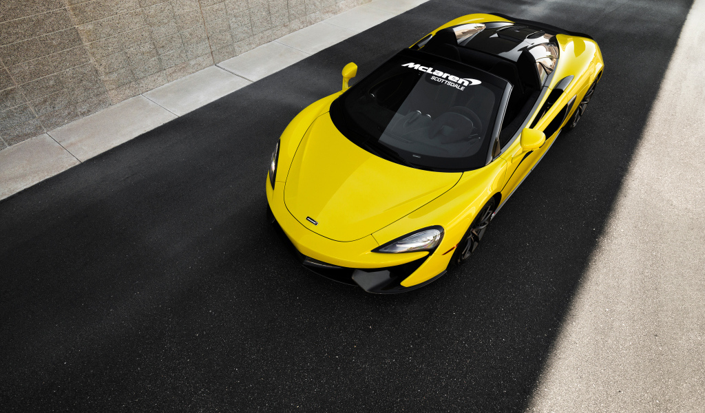 Yellow sports car McLaren 570S Spider, 2018 top view
