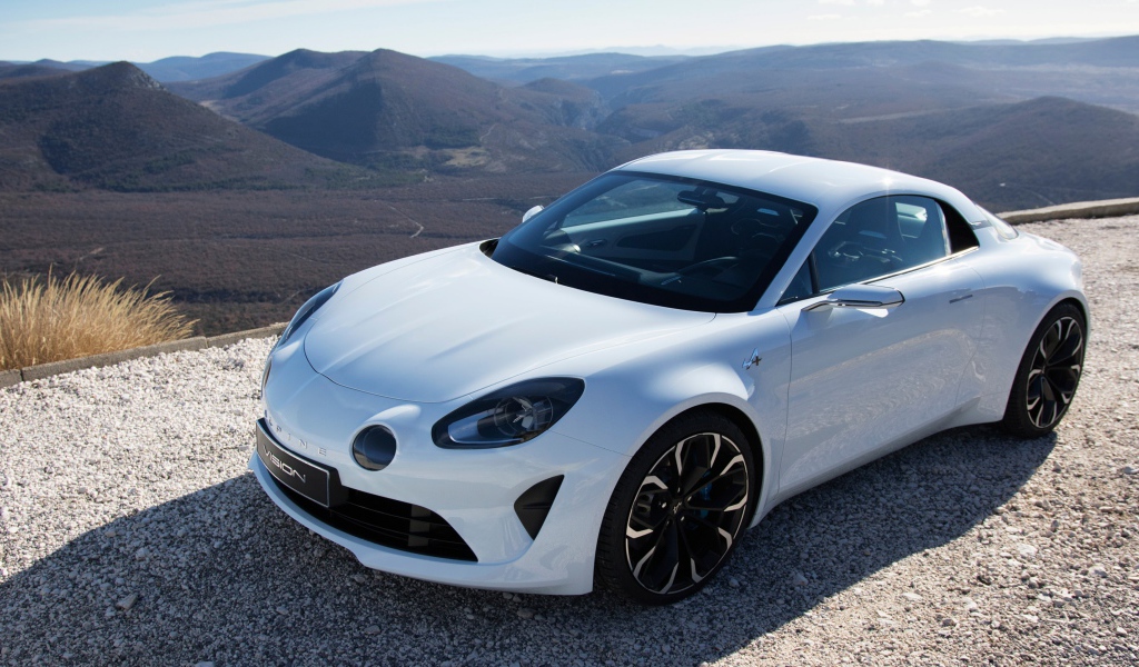 Белый автомобиль  Alpine A110 на дороге