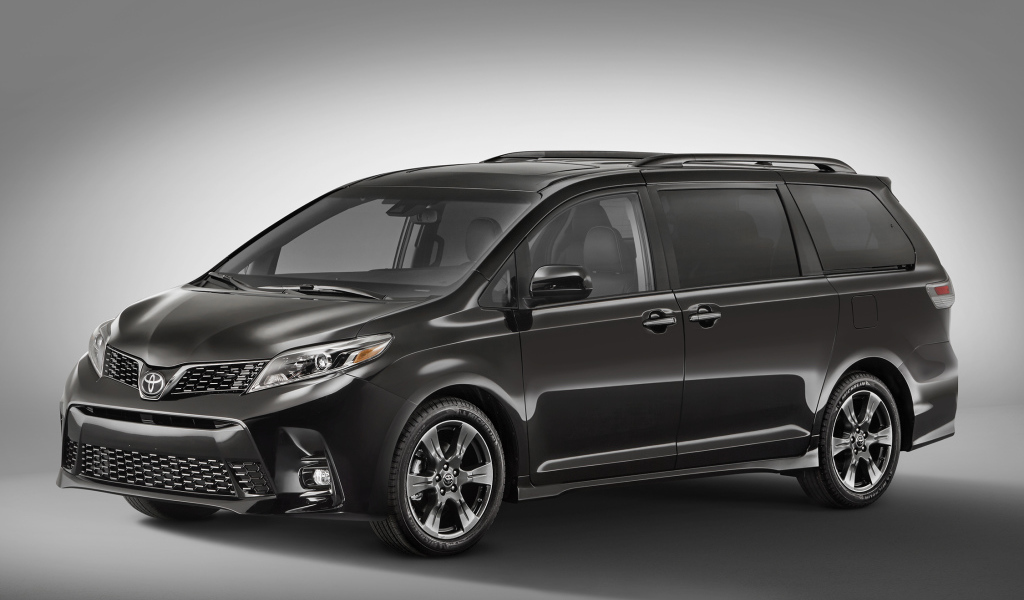Минивэн Toyota Sienna, 2018 на сером фоне