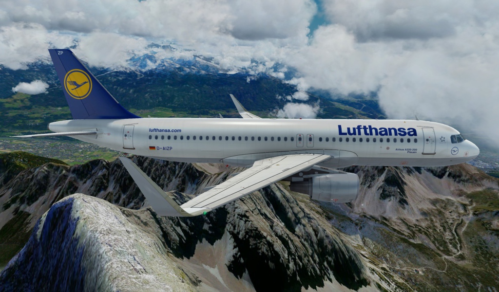 Airbus A320 авиакомпании Lufthansa полет над горами 