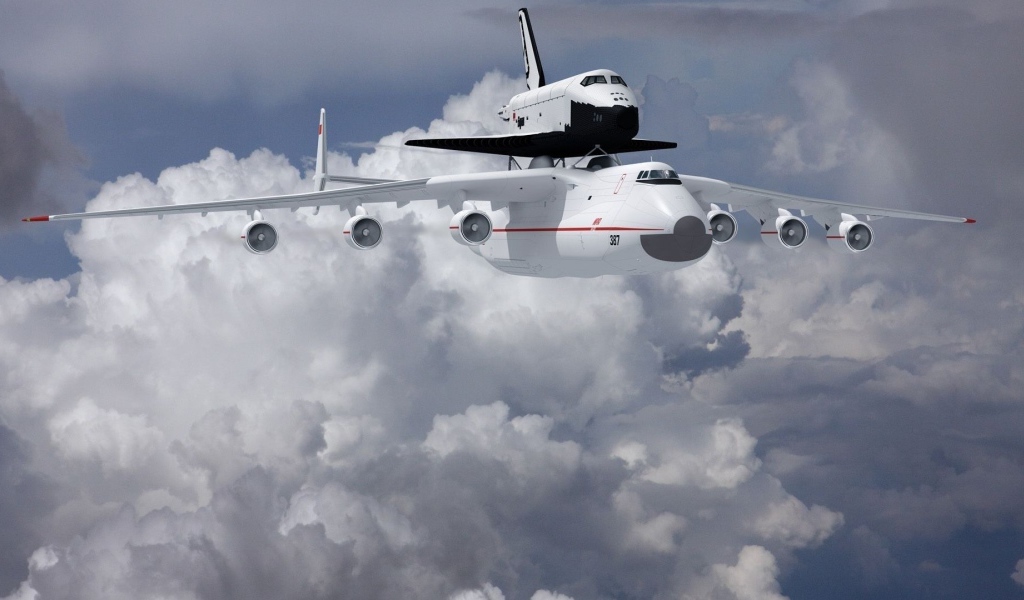 Самолет Ан- 225 Мрия  и ракета носитель «Буран» в на фоне белых облаков 