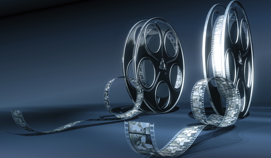 Кинопленка на бобине серый фон 