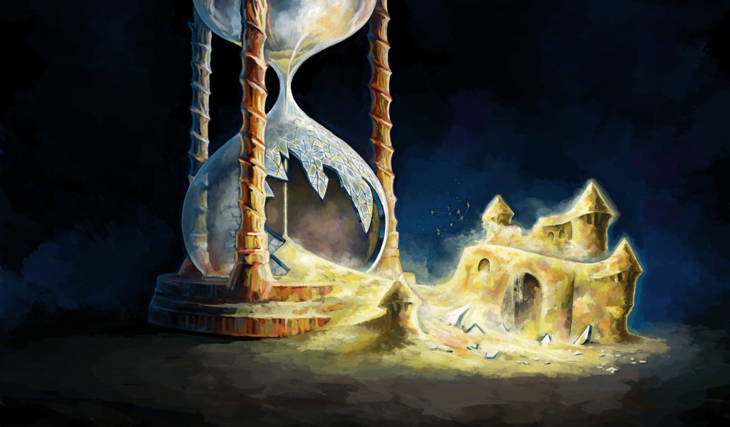 Разбитые песочные часы с замком из песка 