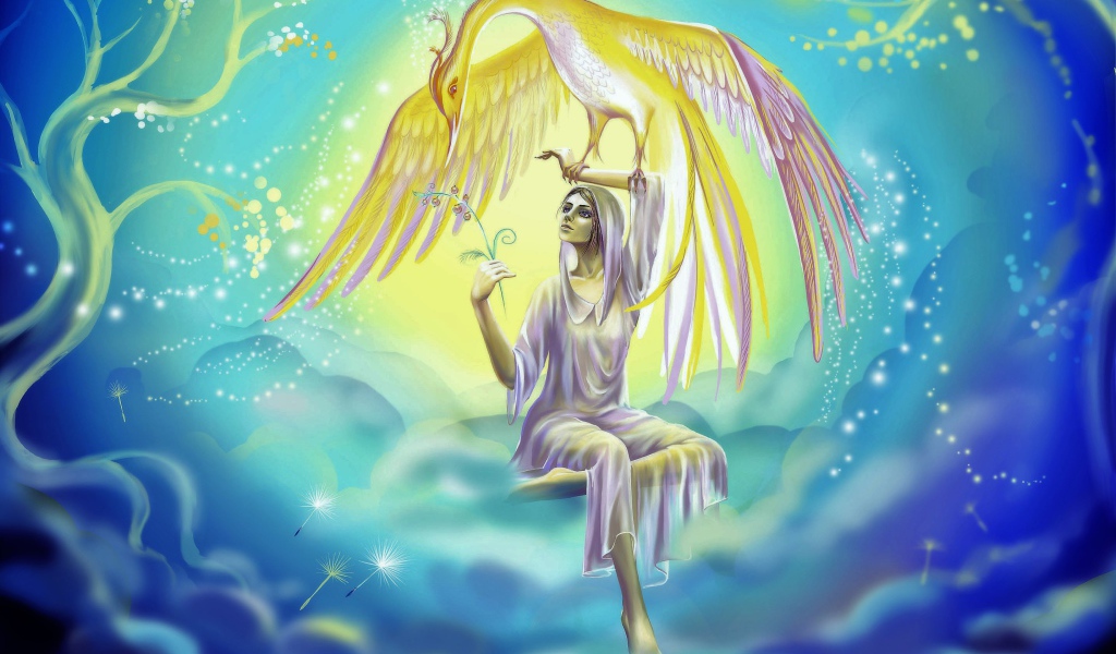 Красивая фантастическая девушка держит на руке птицу феникс