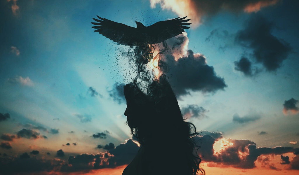 Черная птица вылетает из головы девушки