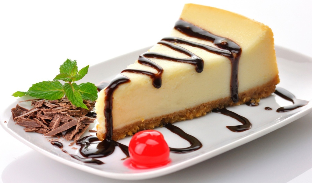 Кусочек аппетитного чизкейка с шоколадом 
