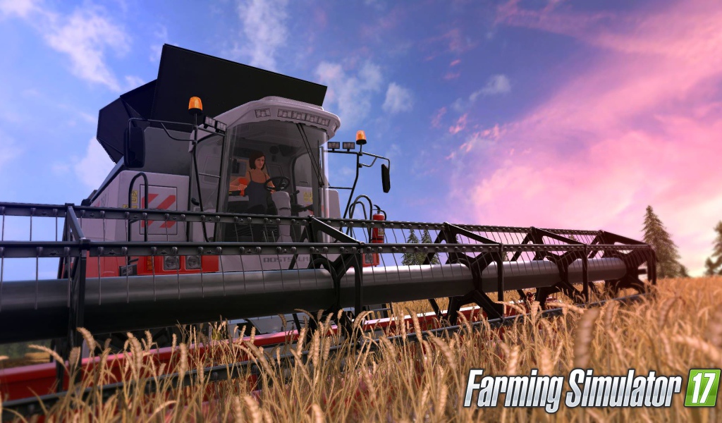 Зерноуборочный комбайн убирает пшеницу игра Farming Simulator 2017 