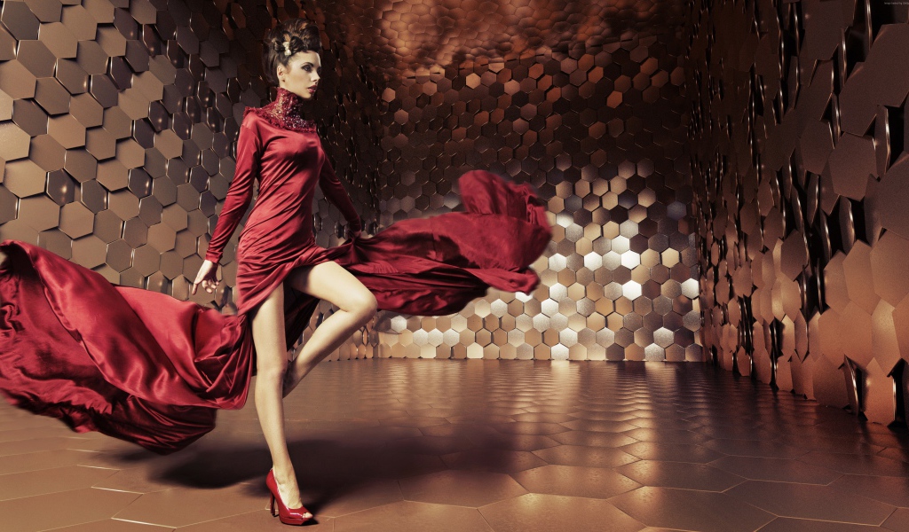 Красивая гламурная девушка в красном платье