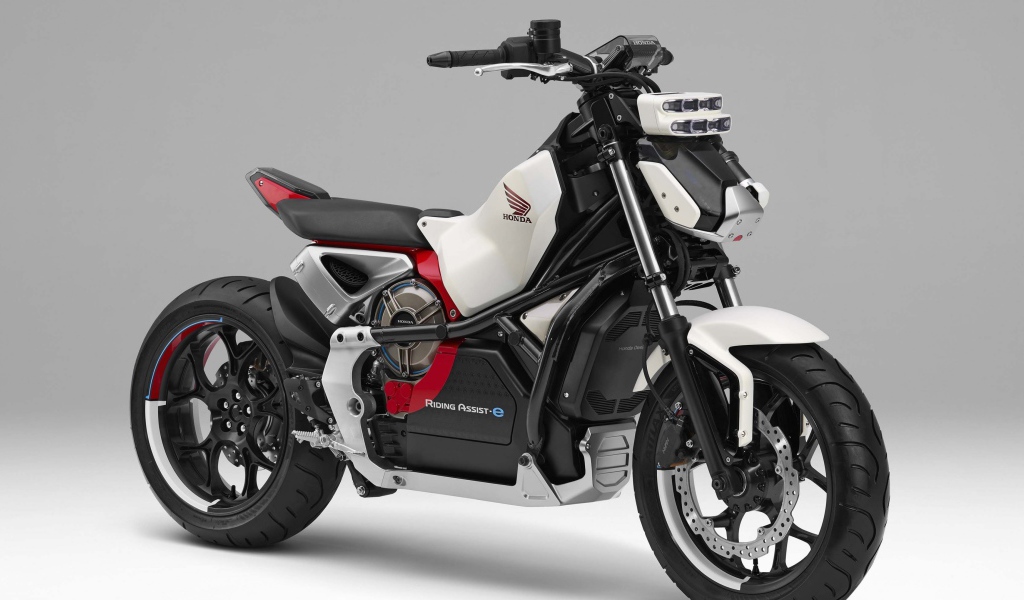 Быстрый мотоцикл  Honda Riding Assist-e Concept на сером фоне
