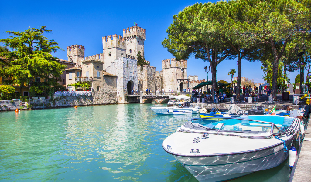 Ancient castle Scaliger near the blue water of Lake Garda, Sirmione. Italy