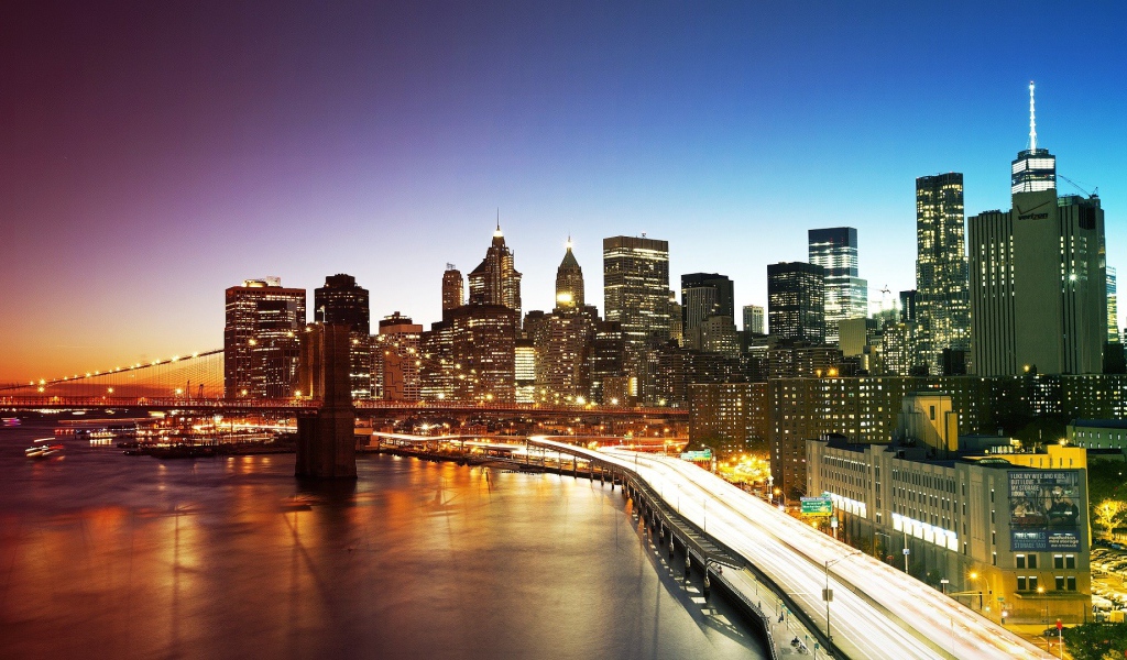 Brooklyn Bridge and the night lights of New York City