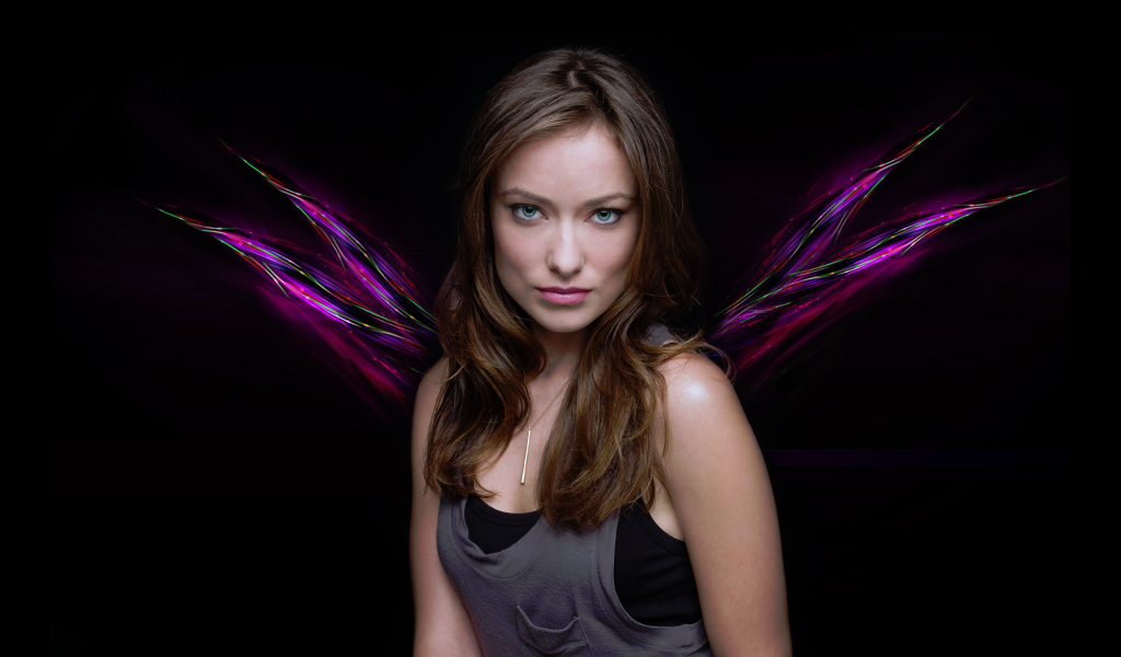 Американская актриса Оливия Уайлд с зелеными глазами 