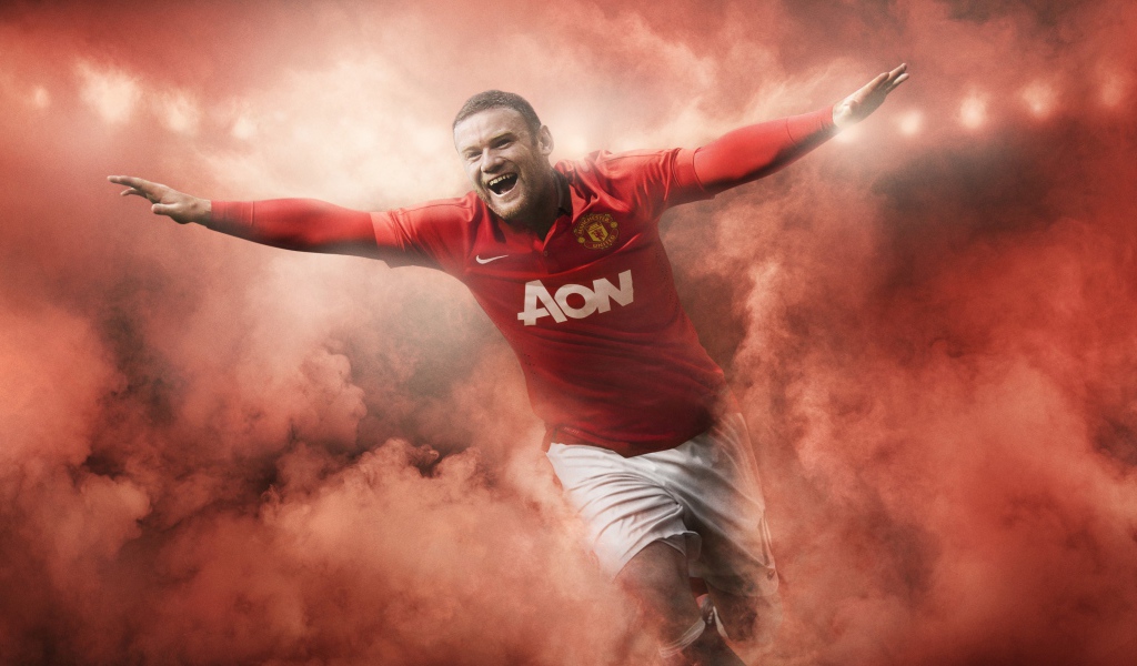 Футболист Уэйн Руни радуется победе 