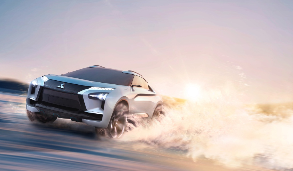 Электрический внедорожник Mitsubishi e-Evolution на крутом повороте