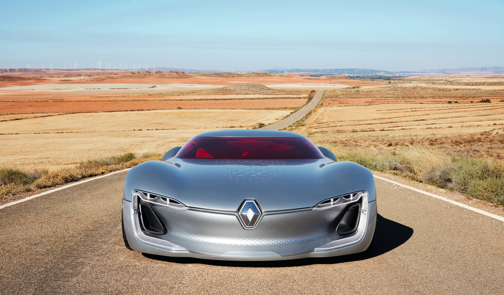 Стильный серебристый электромобиль  Renault Trezor на трассе 