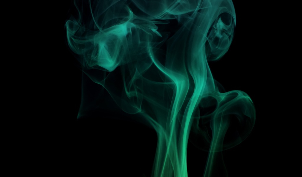 Зеленый дым на черном фоне