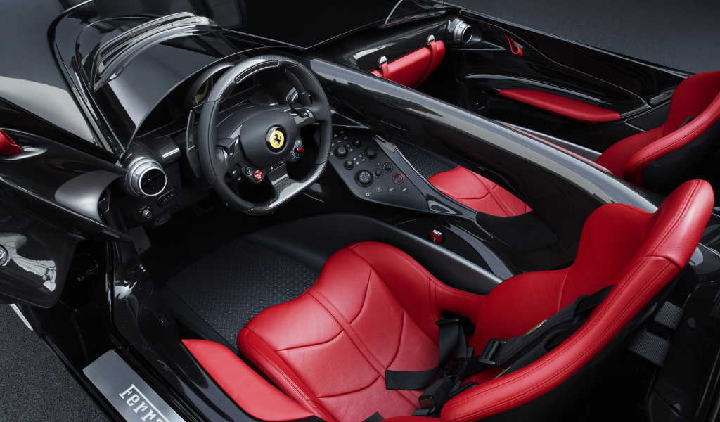 Стильный кожаный салон автомобиля ferrari monza