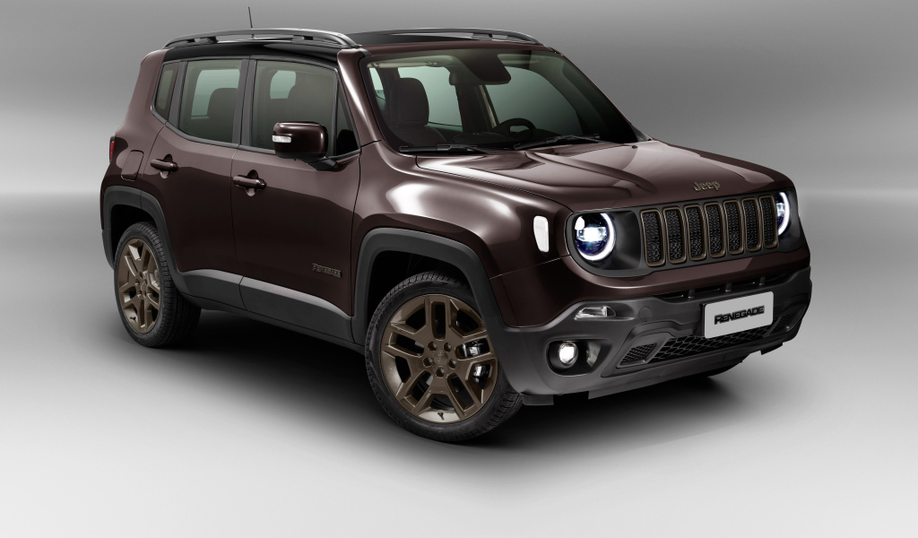 Коричневый Jeep Renegade  2018 года на сером фоне