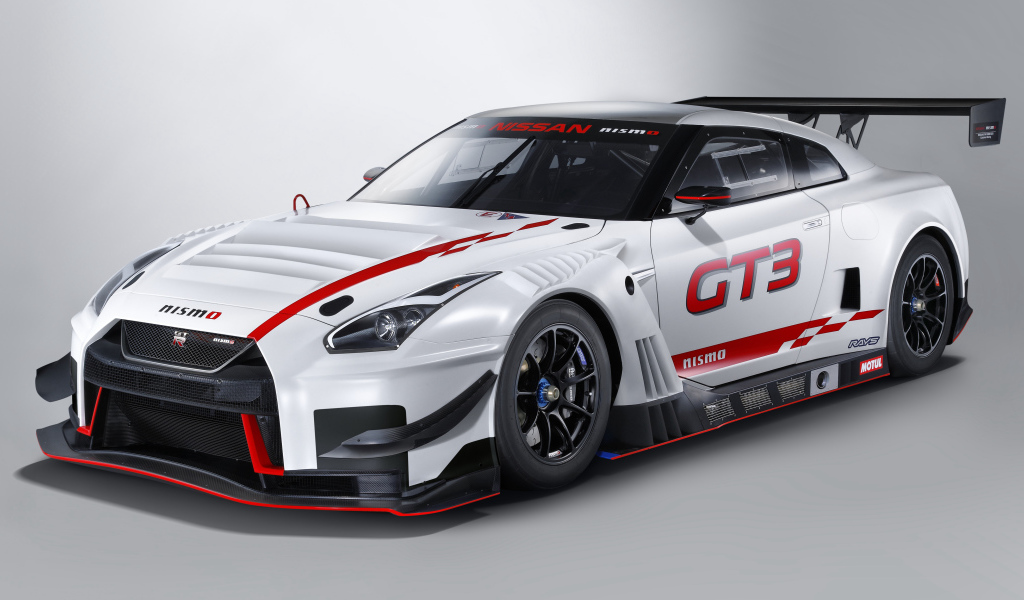 Спортивный автомобиль Nissan GT-R Nismo GT3, 2018 на сером фоне