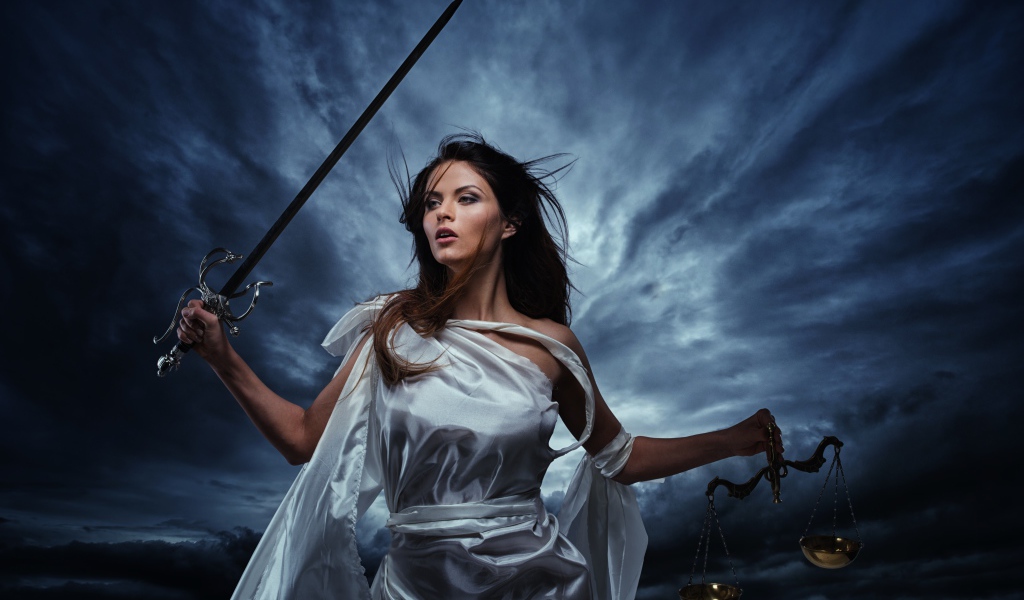 Girl with a sword and weights in the hands against the backdrop of a stormy sky, fantasy
