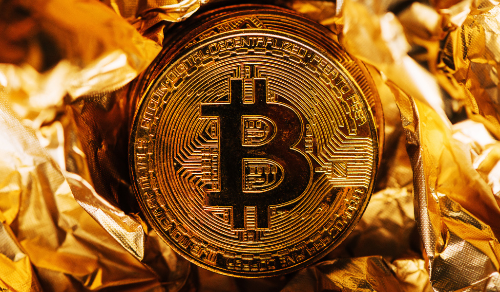 Bitcoin Gold Coin On Foil Desktop Wallpapers 1024x600