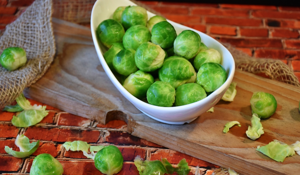 Little green Brussels sprouts on the table
