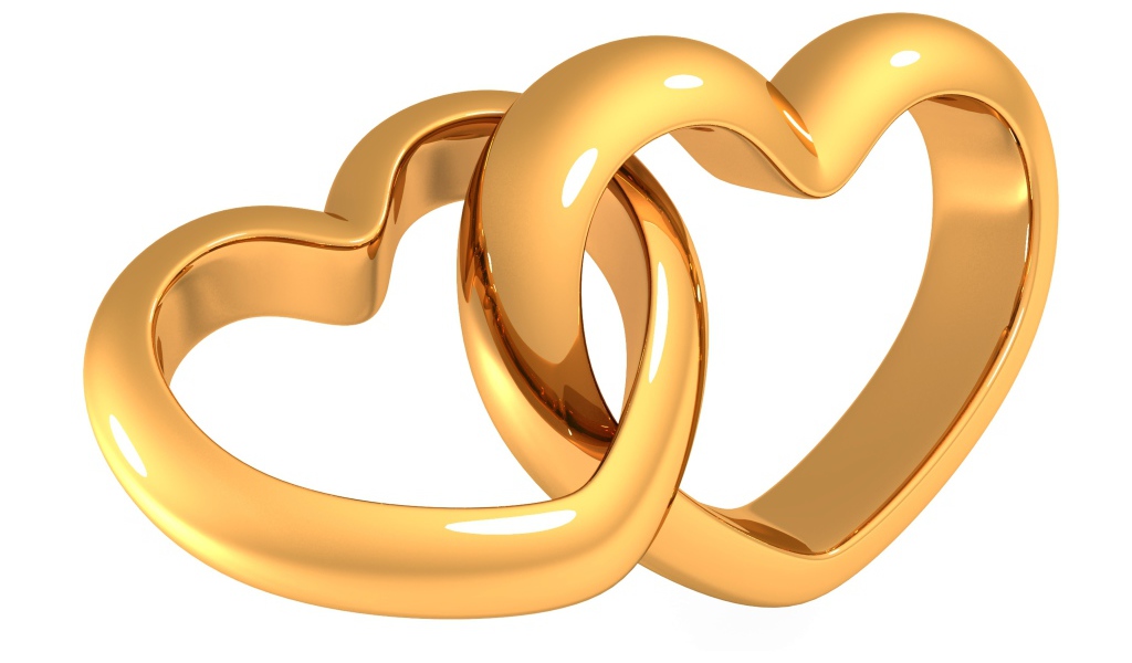 Два золотых сердца на белом фоне