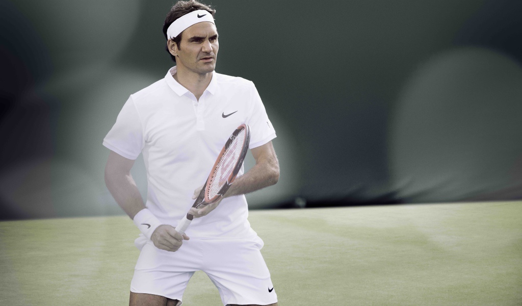 Популярный теннисист  Роджер Федерер на корте