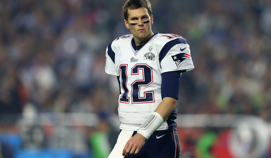 Игрок в американский футбол Том Брэди