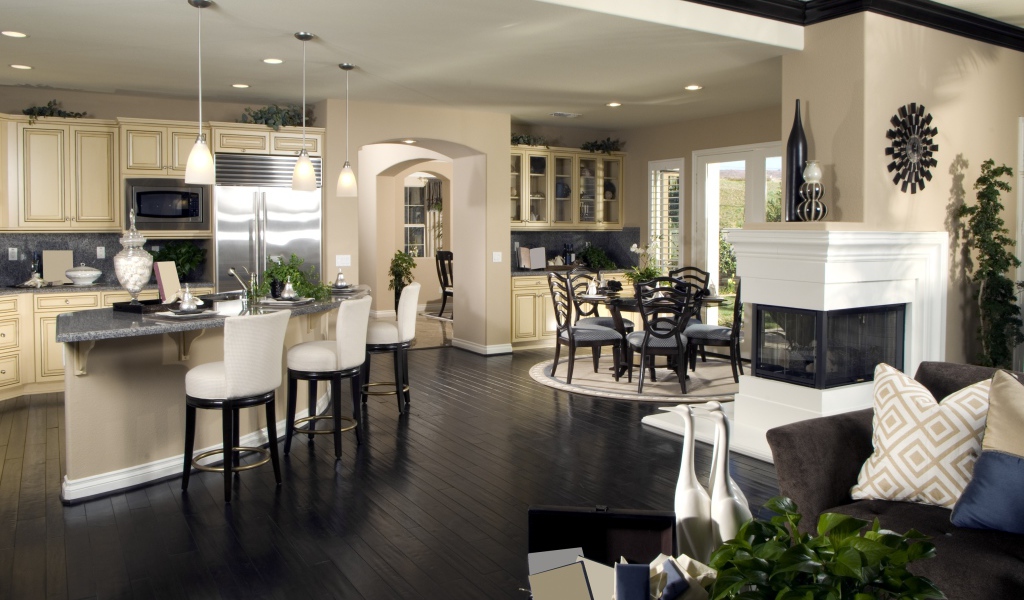 Красивая гостинная с кухней в пастельных тонах 