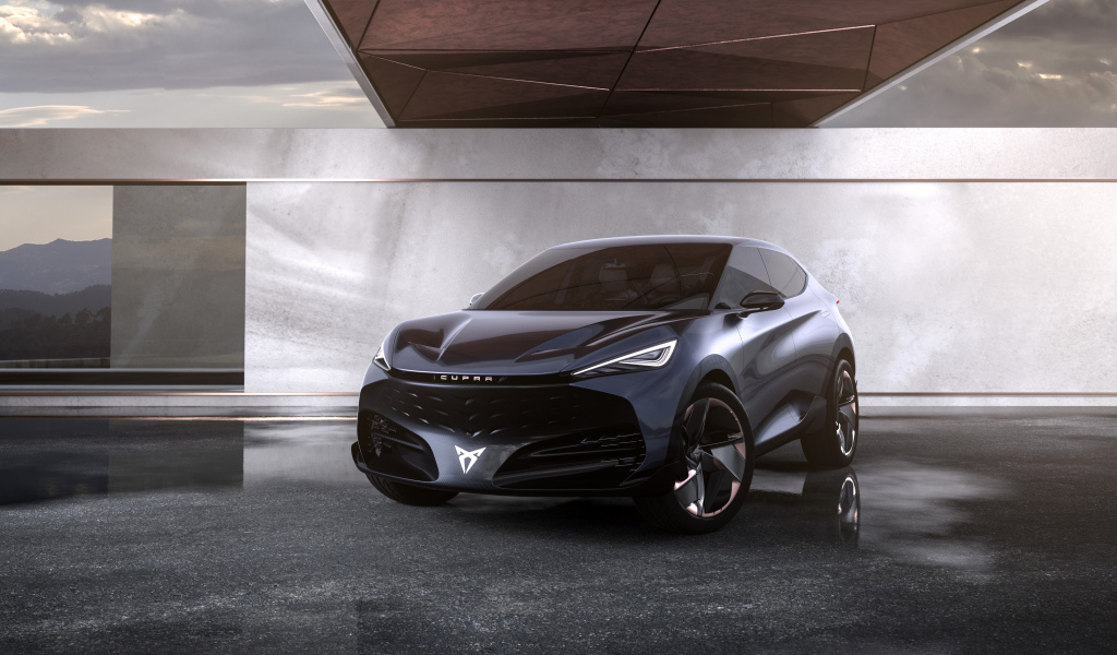 Черный автомобиль Cupra Tavascan Concept в здании 