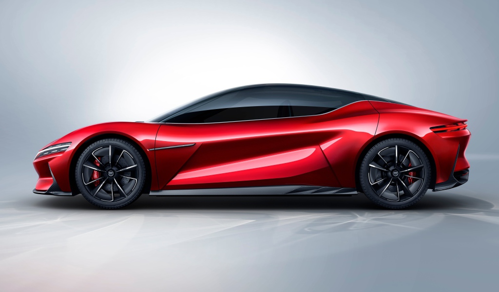 Красный автомобиль BYD E-SEED GT 2019 года на сером фоне