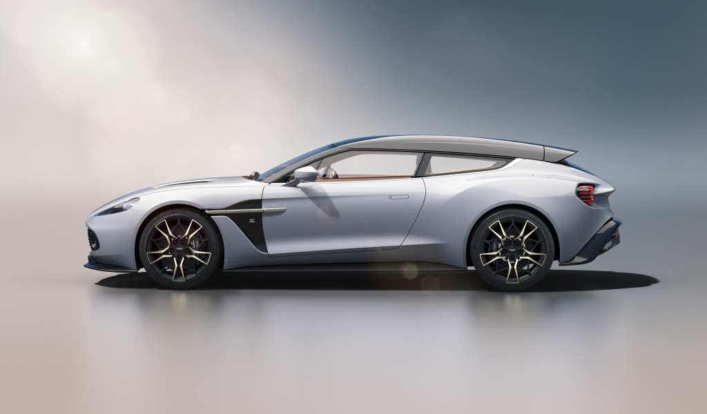 Серебристый автомобиль Aston Martin Vanquish 2019 вид сбоку