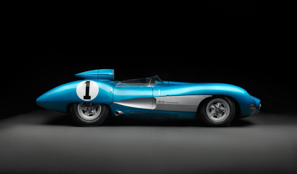 Спортивный ретро автомобиль Chevrolet Corvette SS XP 64,  1957 года на черном фоне