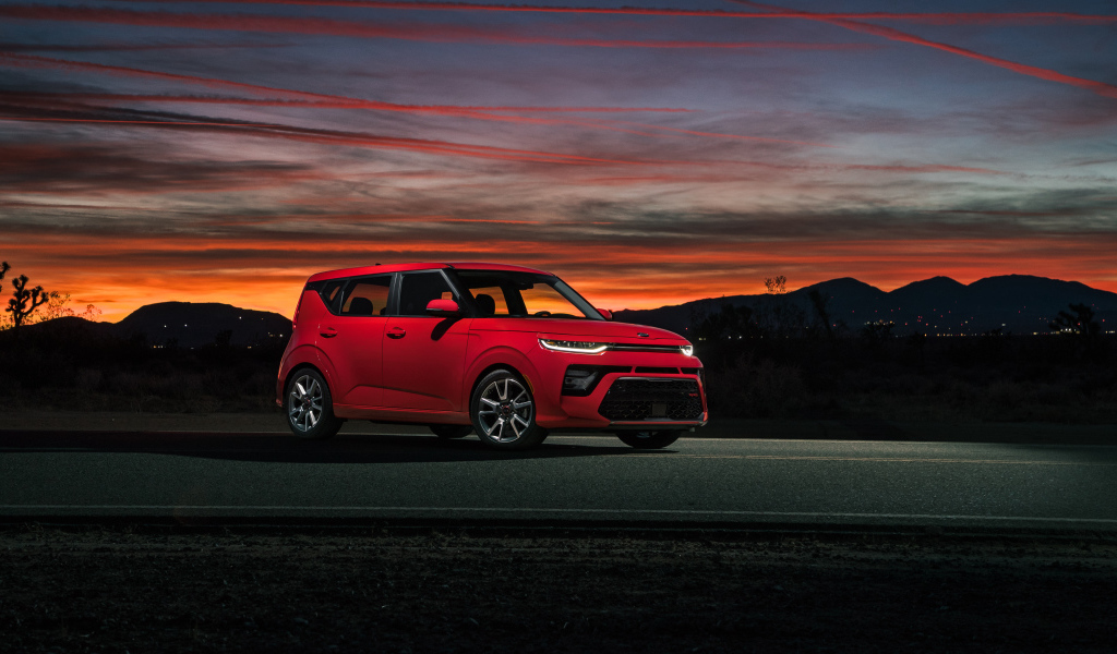 Red car Kia Soul GT-Line, 2020 against the night sky
