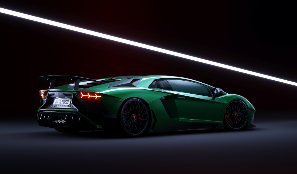 Зеленый спортивный автомобиль Lamborghini Aventador вид сзади
