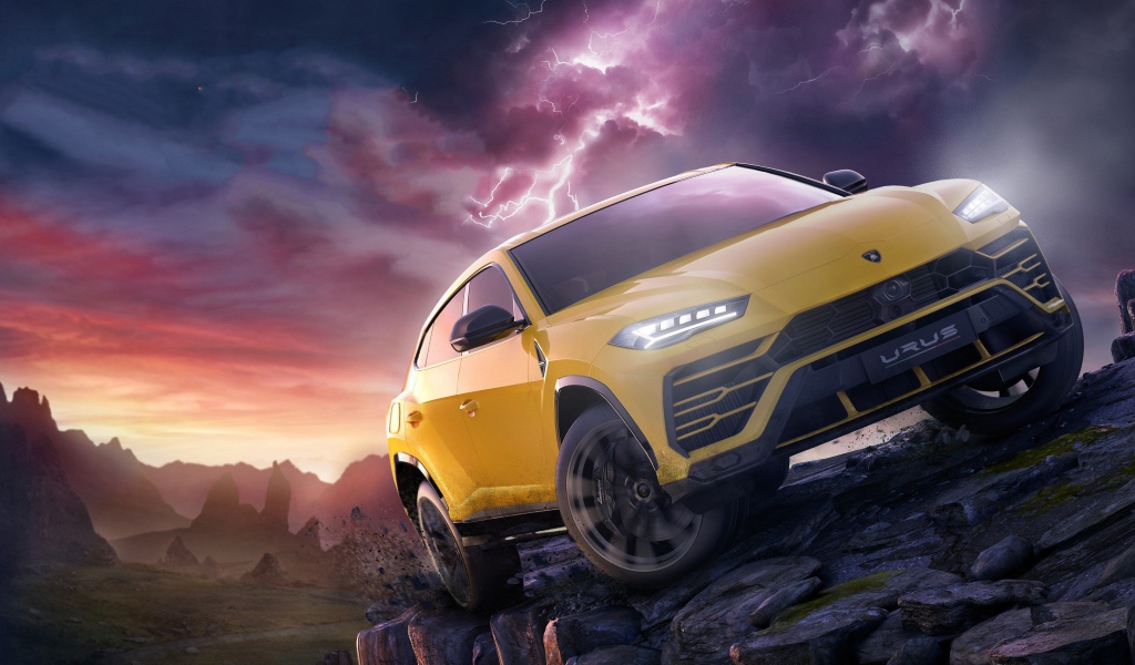 Желтый внедорожник Lamborghini Urus в горах