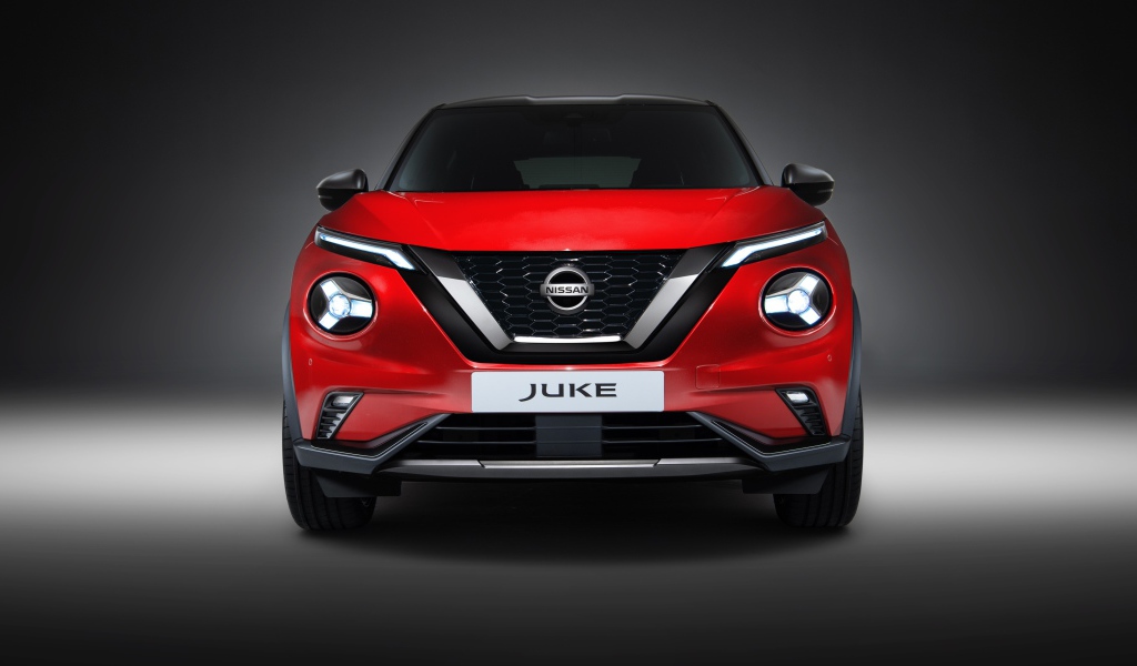 Красный автомобиль Nissan Juke 2019 года вид спереди