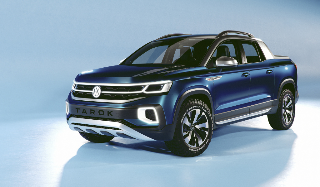 Синий внедорожник Volkswagen Tarok Concept 2019 года на голубом фоне