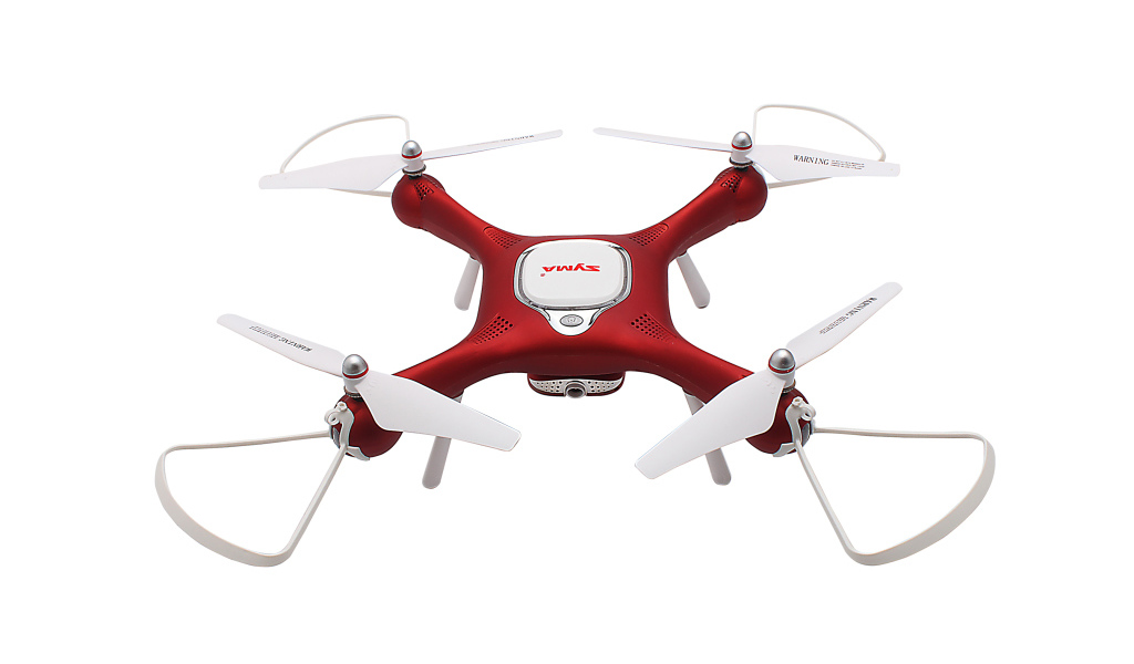 Red drone SYMA X25W on a white background