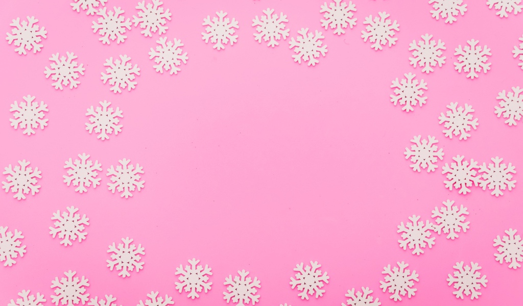 Много белых снежинок на розовом фоне