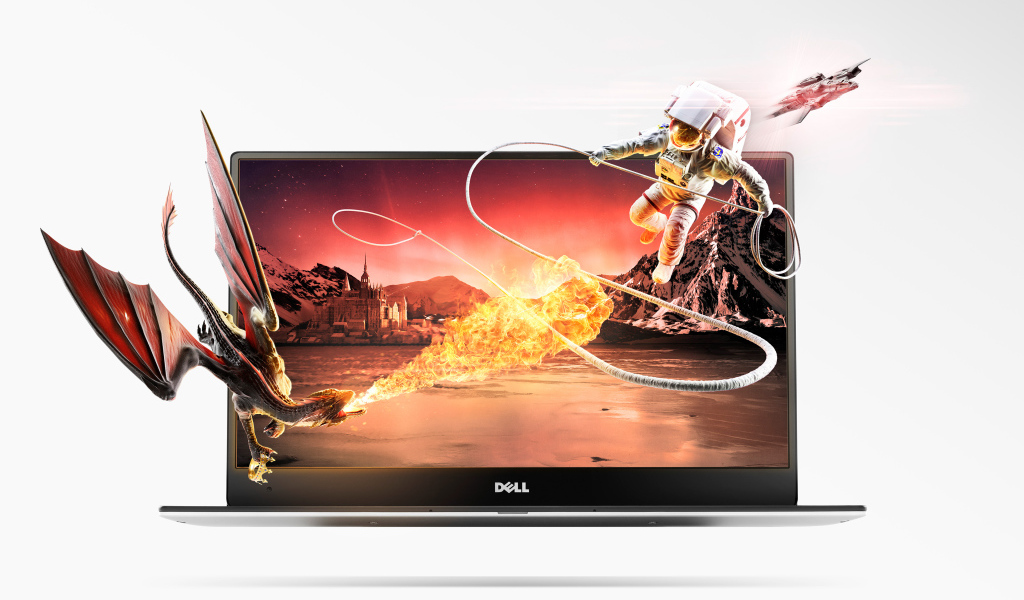 Дракон и астронавт вылетают из ноутбука Dell на белом фоне