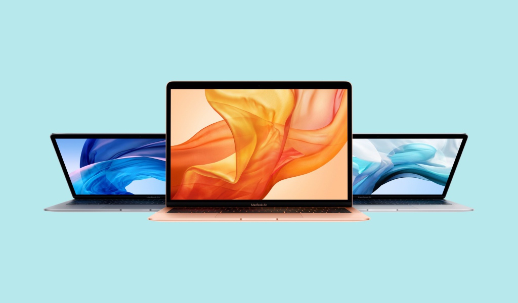Тонкие макбуки MacBook Air на голубом фоне