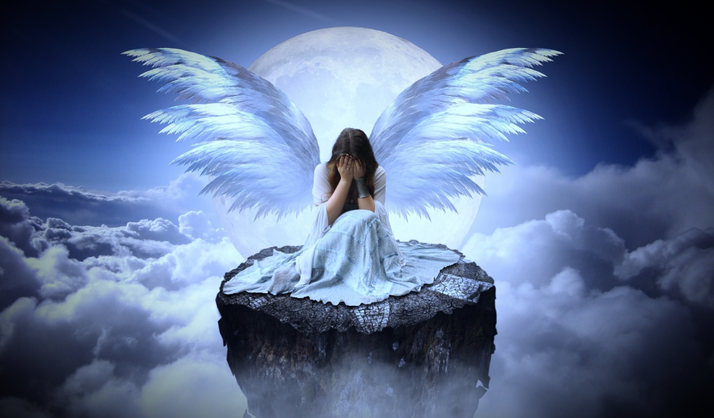 Девушка с крыльями ангела сидит на камне в облаках