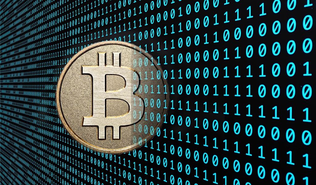 Bitcoin coin on the background of a numeric code
