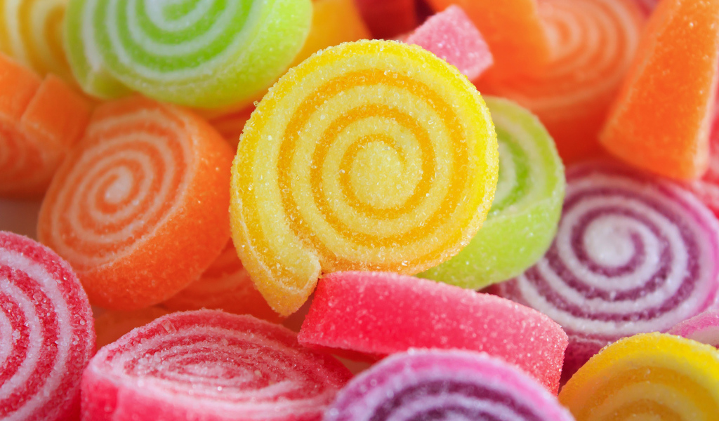 Разноцветный  сладкий мармелад в сахаре крупным планом