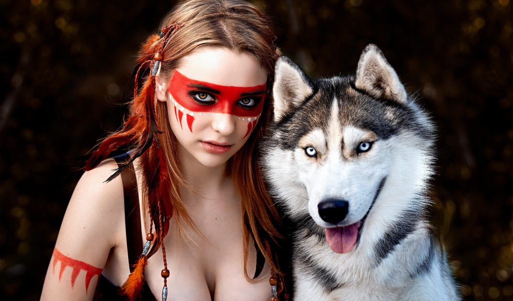 Девушка с макияжем индейца с собакой породы хаски